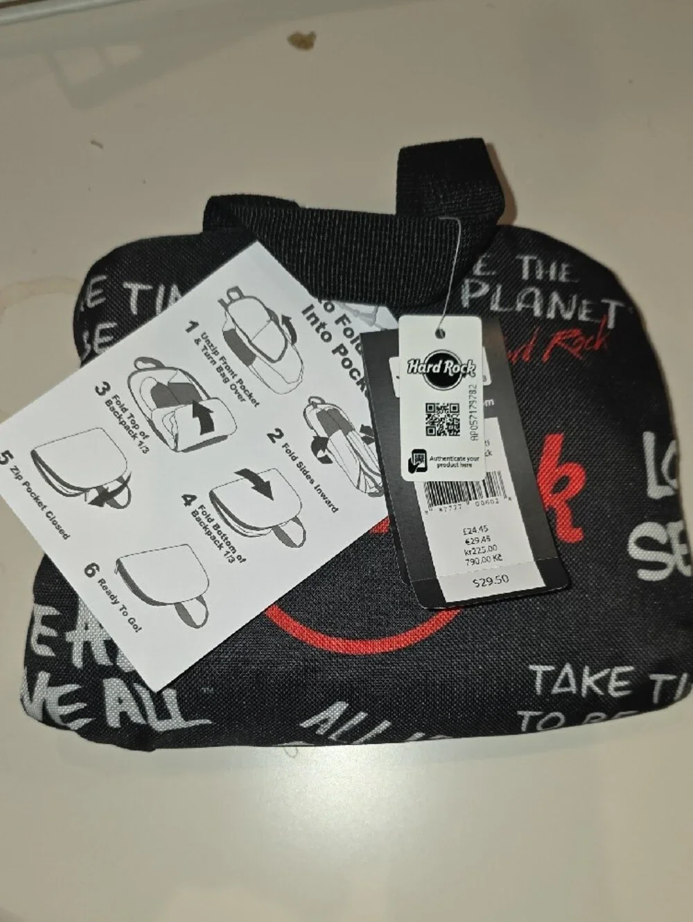 Hard Rock Cafe Black Backpack with Red Logo and White Slogan Print